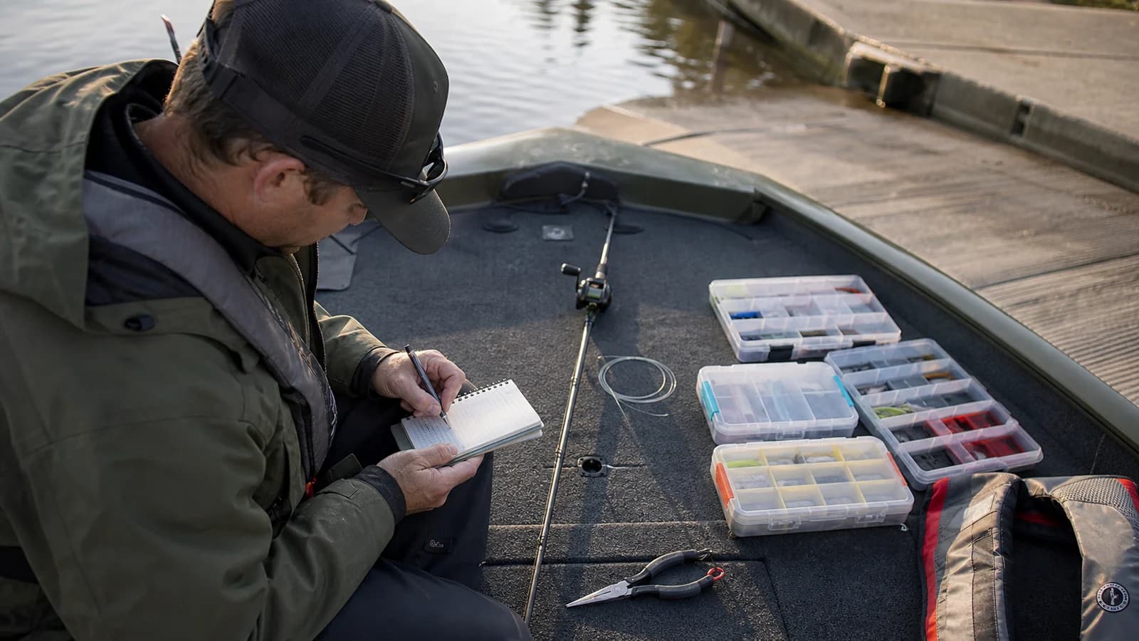 Angler recording a pre-cast workflow on an organized boat deck